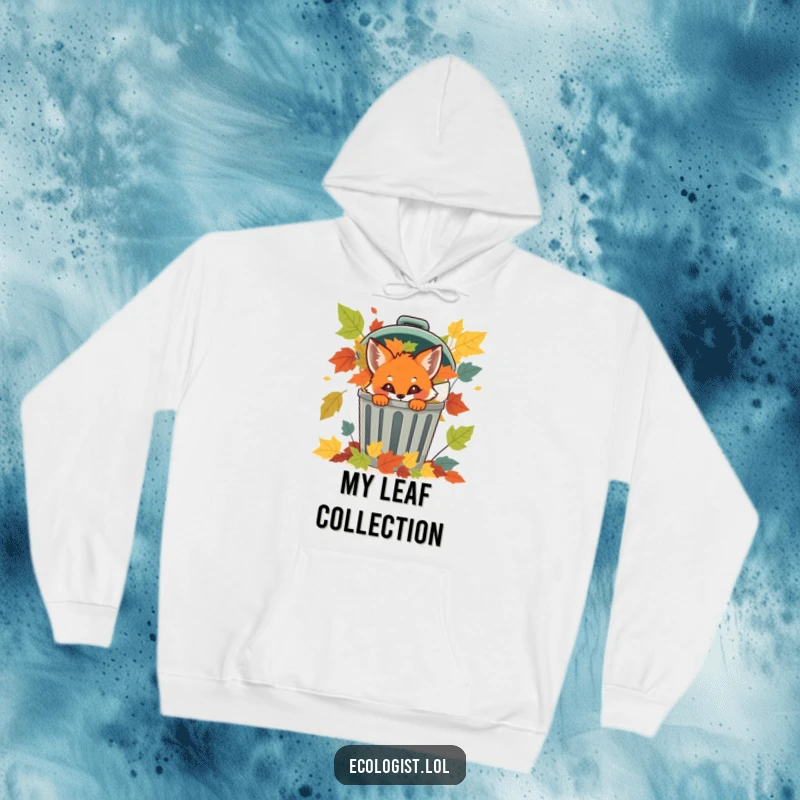 Funny, mischievous fox cub hiding behind a recycling bin filled with colorful leaves on a warm hoodie.